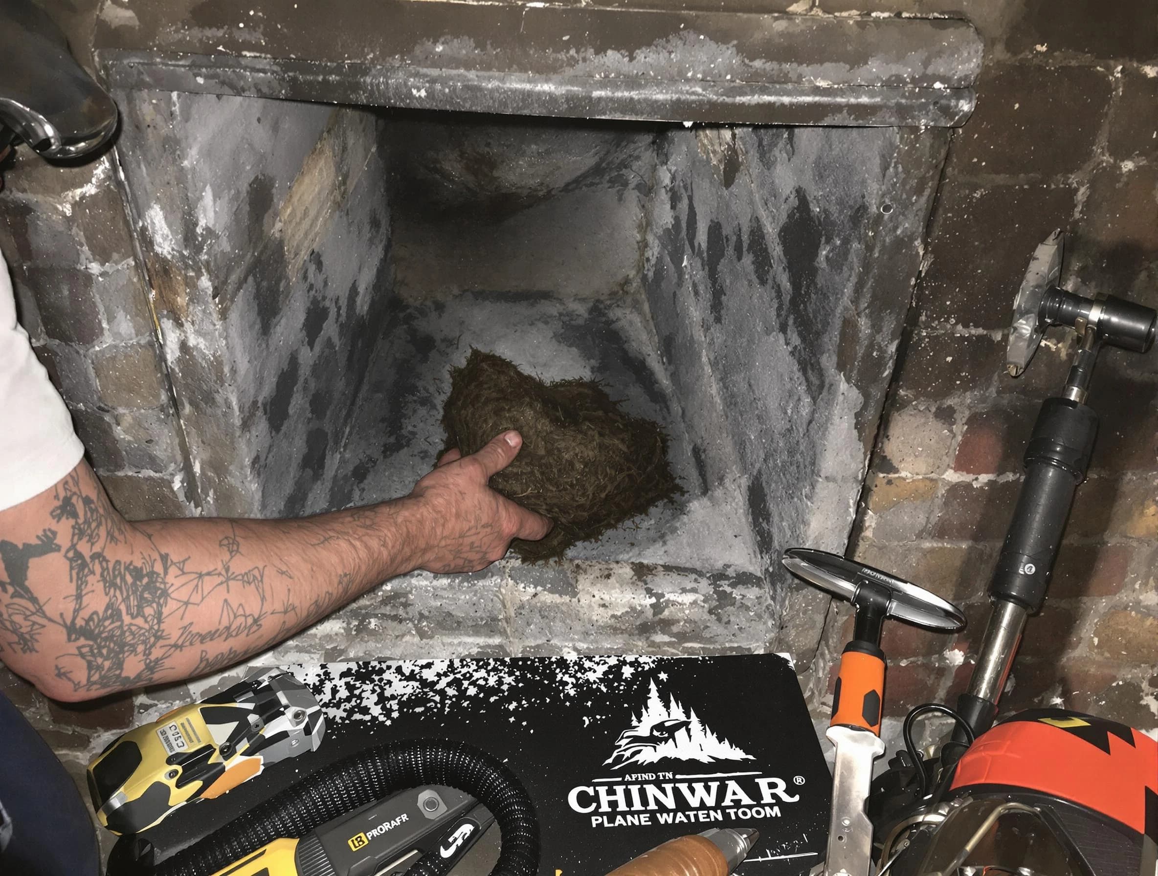 San Tan Valley Chimney Sweep safely removing debris and screening chimney in San Tan Valley, AZ