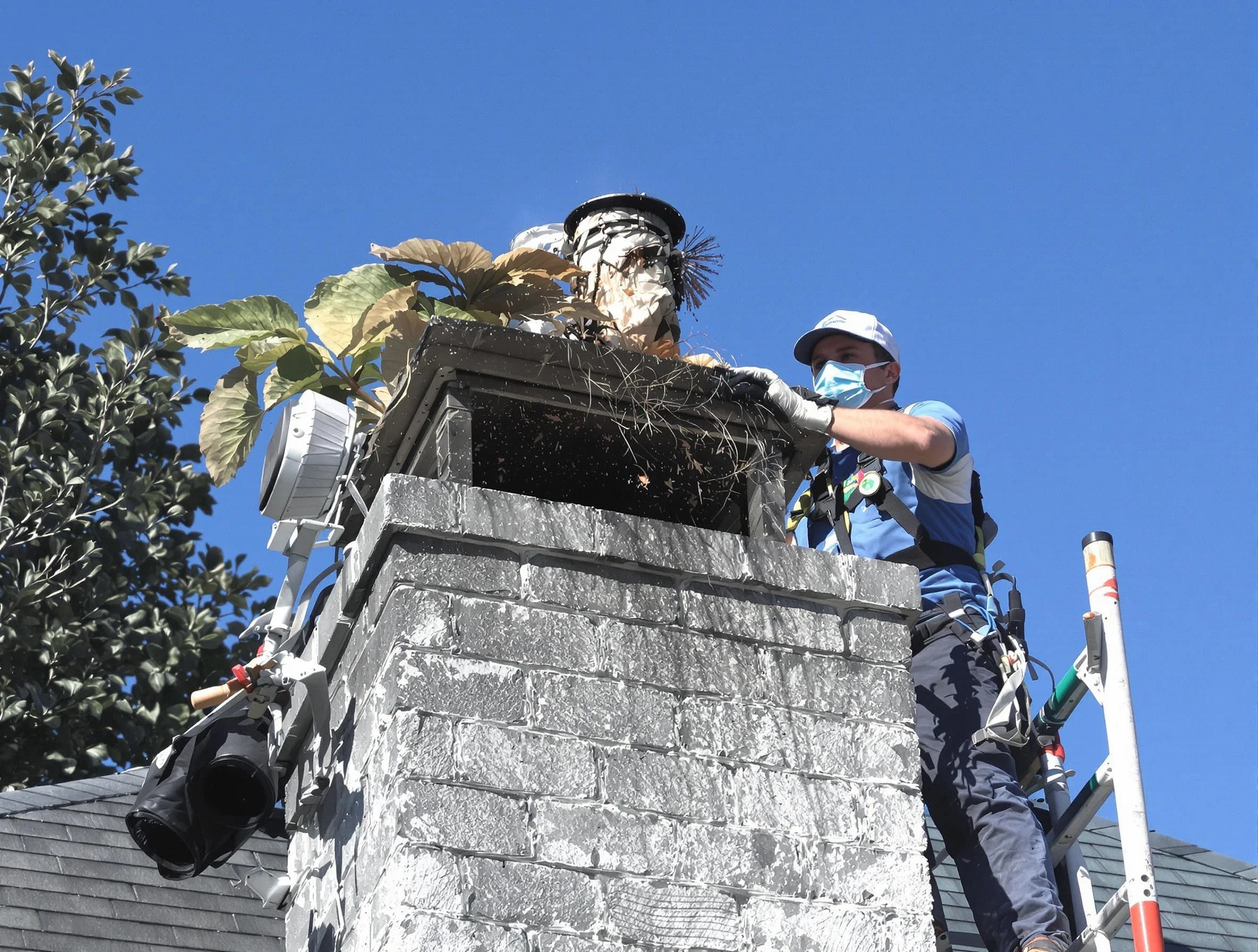 San Tan Valley Chimney Sweep specialist performing chimney cleaning in San Tan Valley, AZ