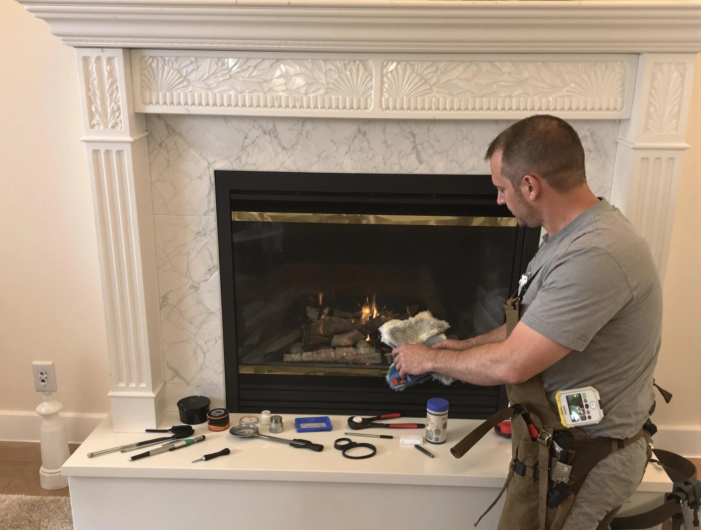 San Tan Valley Chimney Sweep performing fireplace maintenance in San Tan Valley, AZ
